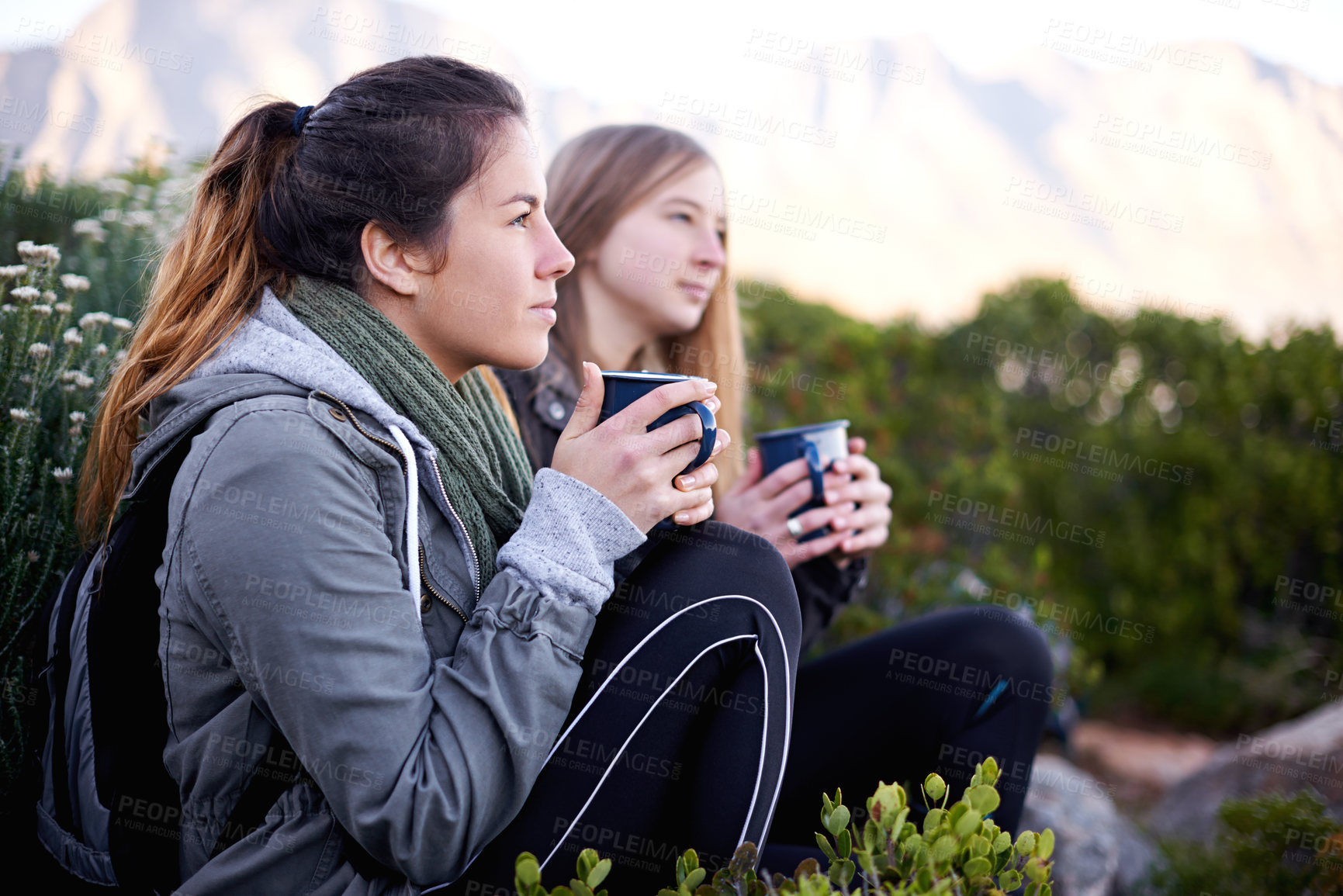 Buy stock photo Hiking, women and friends drinking coffee outdoor, thinking or relax in environment. Trekking, nature and girls with tea cup on adventure, travel and serious on vacation together for journey by bush