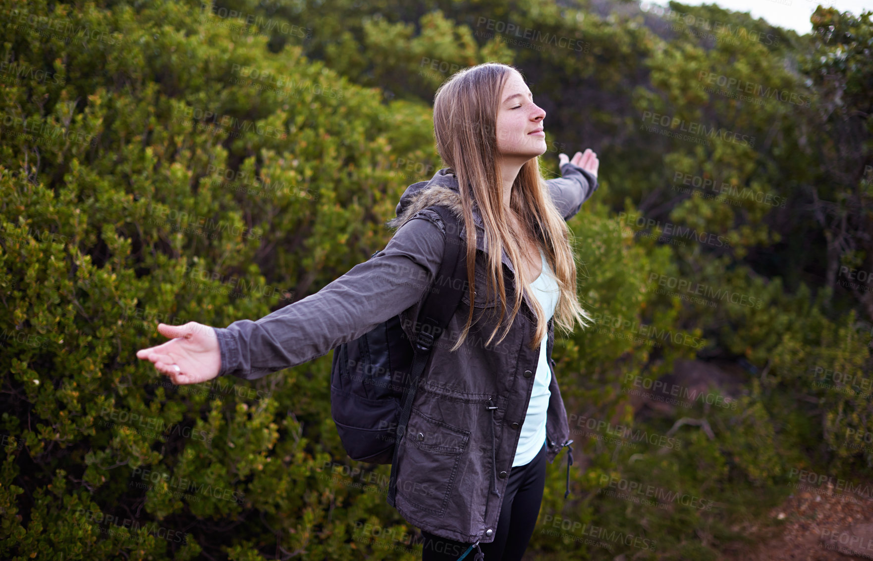 Buy stock photo Woman, hiking and celebration of mountain view for adventure backpacking or journey, travel or freedom. Female person, happy and foliage or training on trekking path or exercise, wellness or fitness