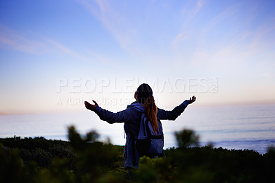 Buy stock photo Hiking, woman and ocean with celebration, back and fresh air with fitness and carefree with breathing. Person, outdoor or hiker with freedom or rear view with girl or healthy with wellness or success