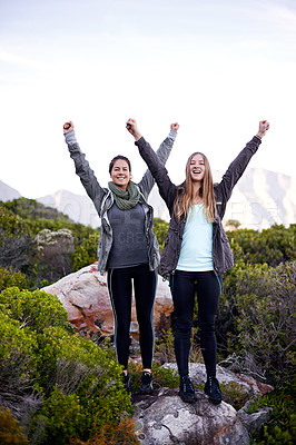 Buy stock photo Woman, friends and portrait for hiking celebration on mountain for exercise training, trekking or environment. Female people, face and arms up for nature workout with cardio, happiness or journey