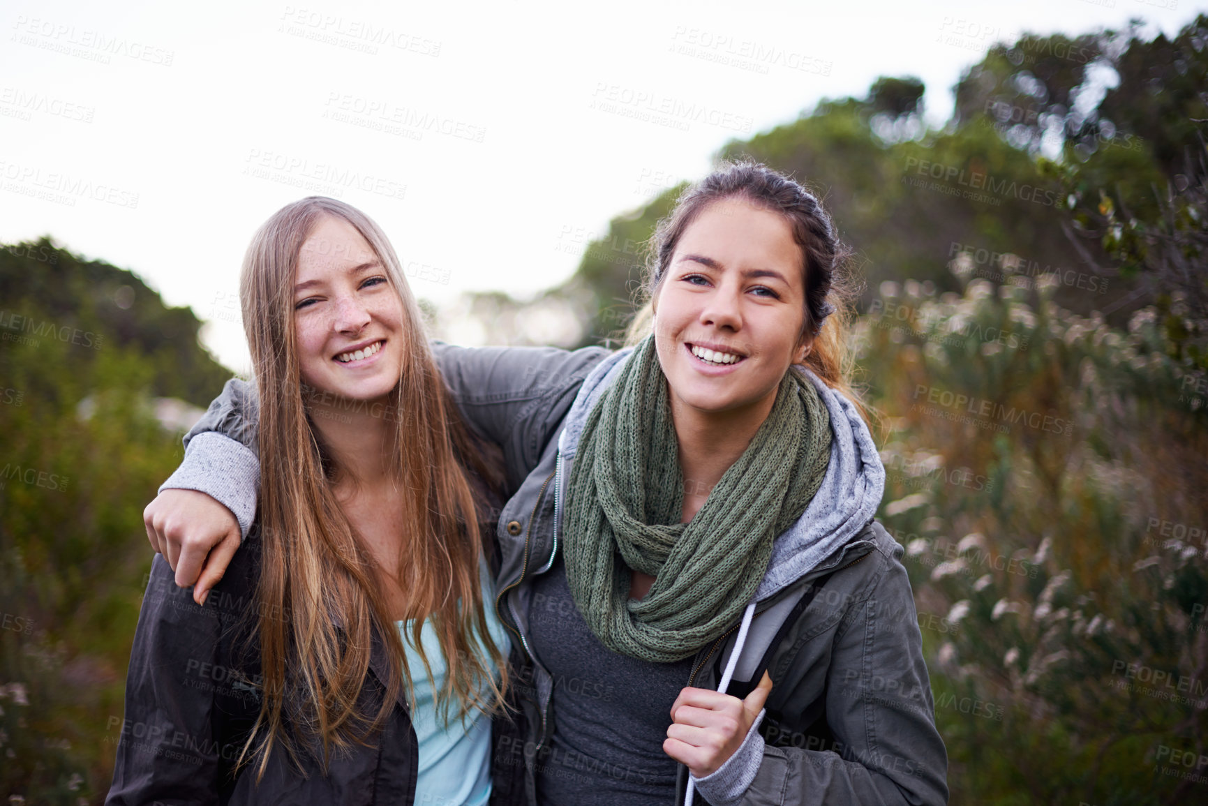 Buy stock photo Portrait of two attractive young female hikers in the outdoors