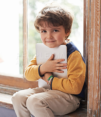 Buy stock photo Home, tablet and portrait of young kid by windowsill for internet, app or game online for learning. Technology, child and cute boy in house for education or relax with digital electronics in Canada
