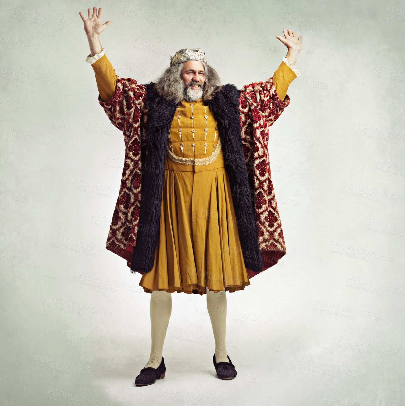 Buy stock photo Royal king man, studio and hands in air for power, magic or winning celebration by gray background. Ancient medieval leader, portrait and full body with fantasy, happiness or vintage robe by backdrop