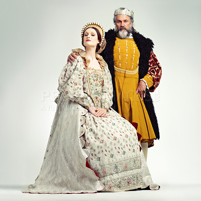 Buy stock photo King, Queen and royal portrait of a couple in studio for renaissance, history and fantasy cosplay art. Medieval man and woman together for authority, crown and power as ruler, leader and royalty