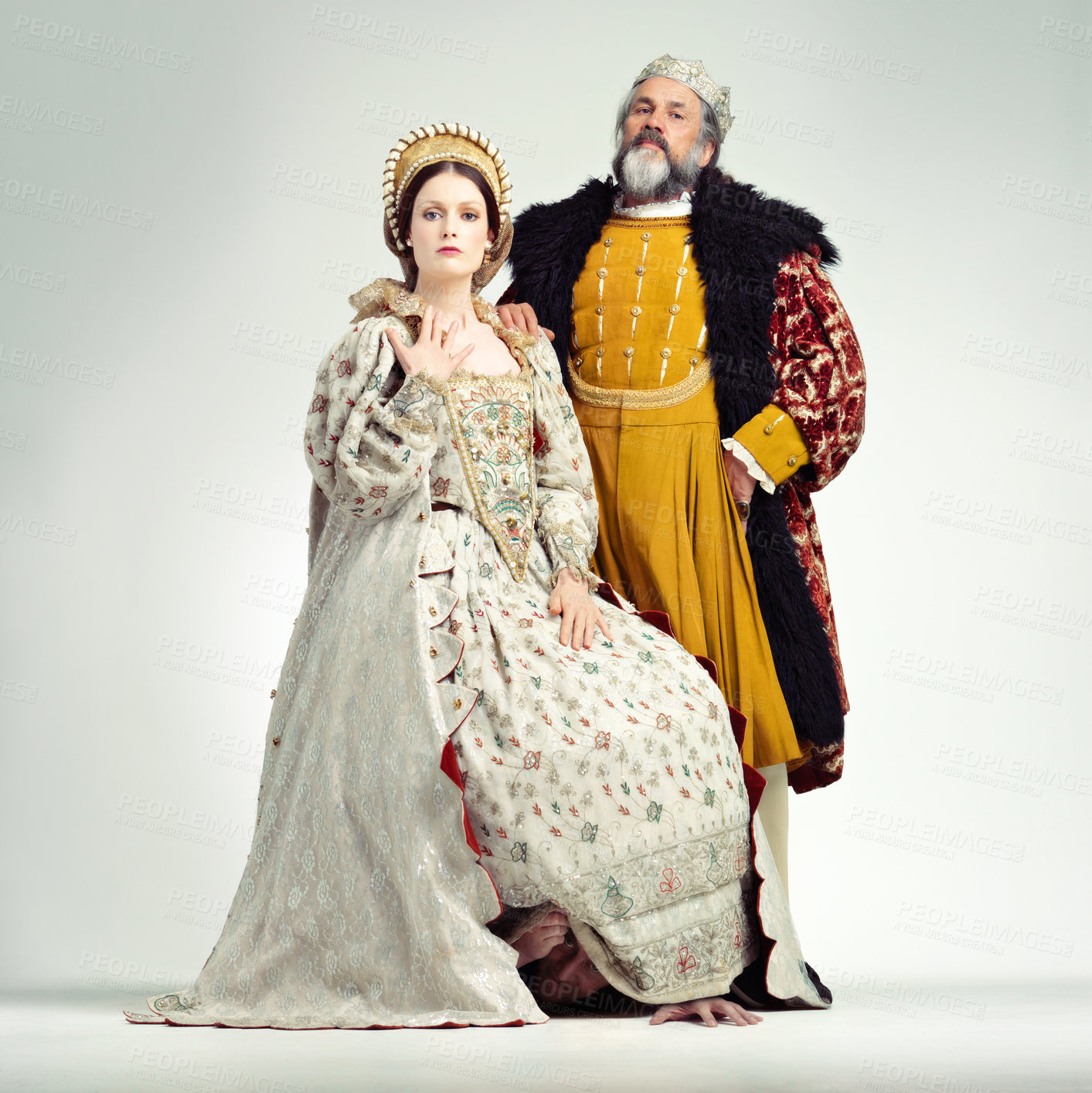 Buy stock photo Fashion, medieval and king with queen on a white background for power, leaders and ruler. History, theatre and royal couple portrait in vintage, renaissance and Victorian cosplay isolated in studio