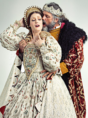 Buy stock photo Medieval king, queen and violence in studio for drama, danger and together with renaissance clothes. Ancient royal couple, surprise and shock with distress, crying and actor with vintage fashion