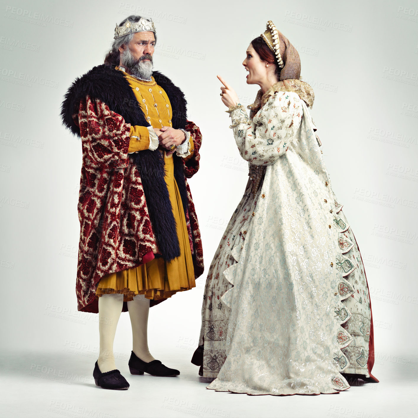 Buy stock photo Studio shot of a king and queen arguing