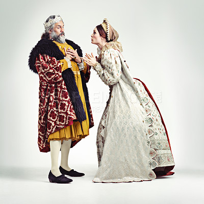 Buy stock photo Studio shot of a king and queen arguing