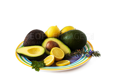 Buy stock photo A plate of herbs, avos and lemons