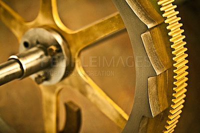 Buy stock photo Clock gear, gold and vintage wheel cog of golden machinery and gears. Metal, closeup and steel with machine detail and maintenance with retro brass parts and wheels