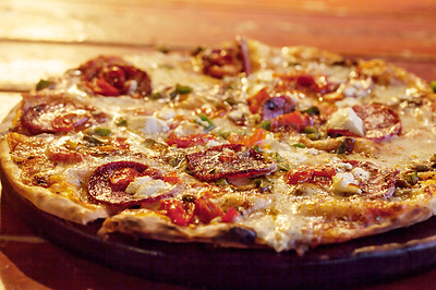 Buy stock photo Closeup shot of a freshly baked pizza