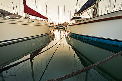 Buy stock photo Shot of yachts moored in a harbour