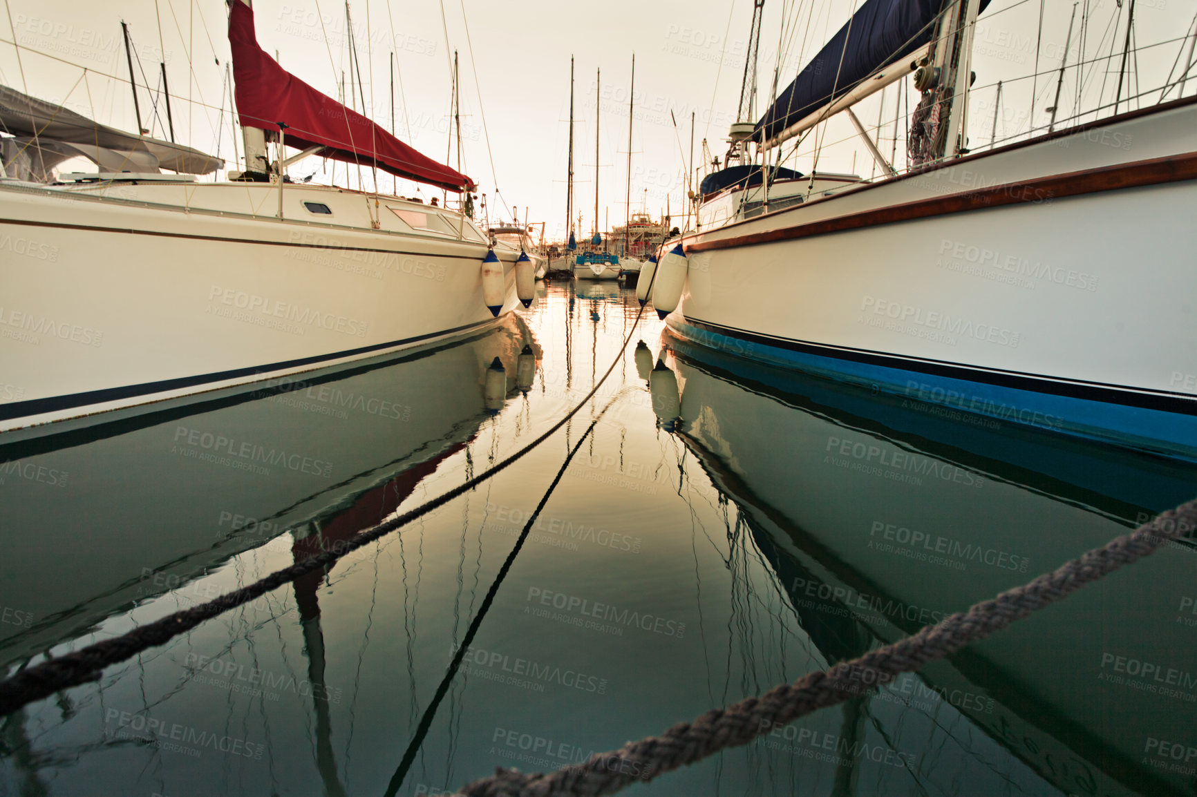 Buy stock photo Shot of yachts moored in a harbour