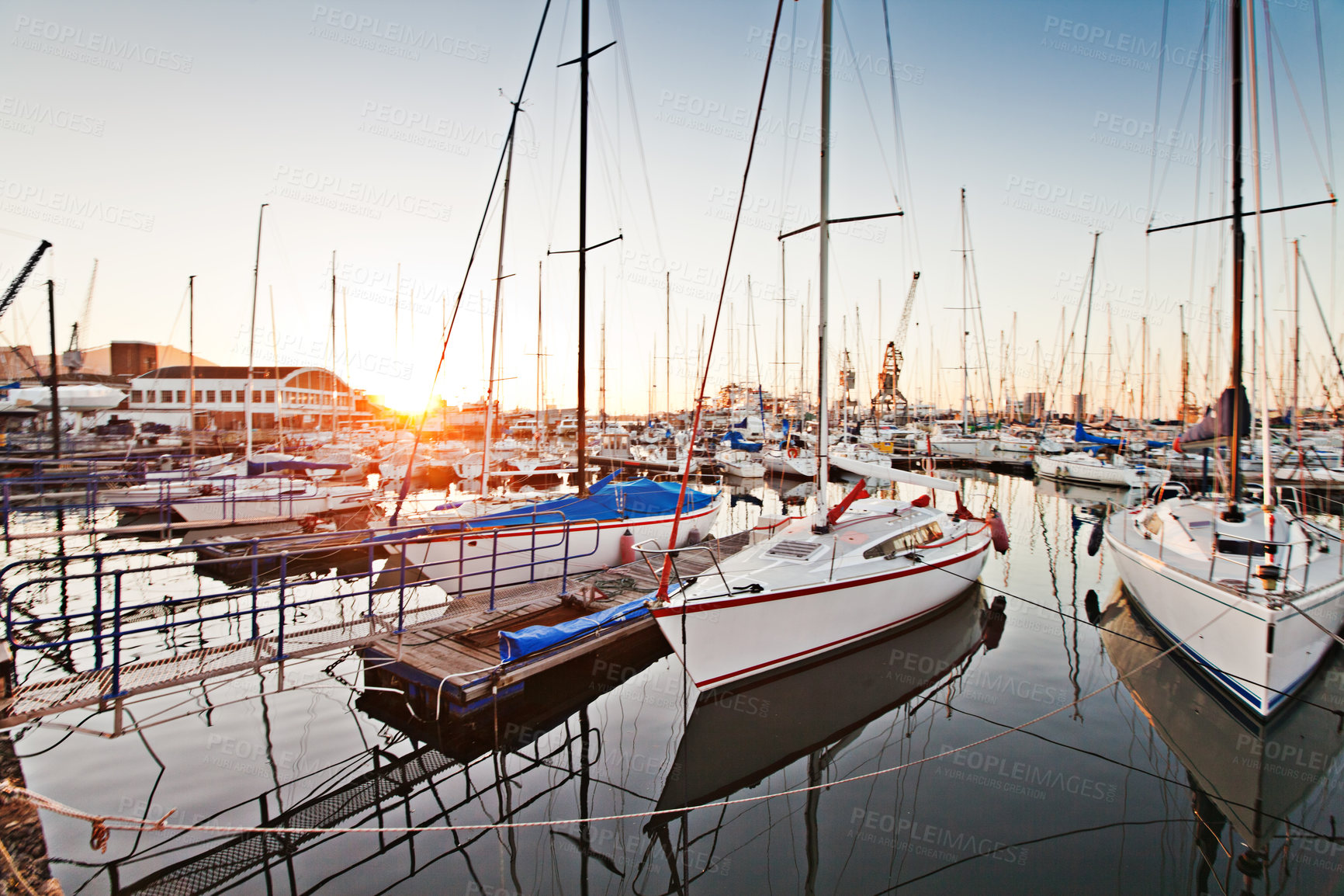 Buy stock photo Shot of a yachts moored in a harbour