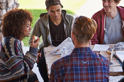Buy stock photo A group of friends around an outdoor table