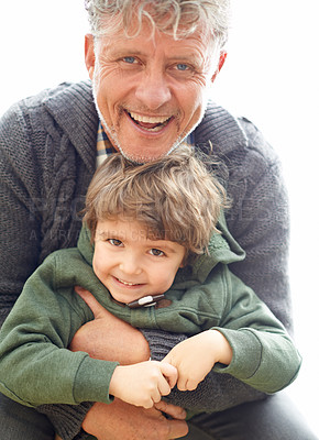 Buy stock photo Grandfather, child and portrait smile for outdoor bonding with love connection, embrace or together. Old person, boy and face with hugging or happiness joy for relaxed holiday, childhood or family