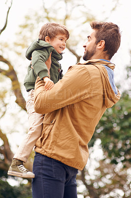 Buy stock photo Father, child and love embrace in nature for bonding connection in forest for autumn happiness, joy or care. Male person, son and holding in woods for holiday vacation or outdoor, family or together