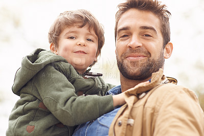 Buy stock photo Father, child and portrait smile in nature for relax bonding on weekend holiday, vacation or connection. Male person, boy and face for outdoor together for parents love or traveling, holding or care