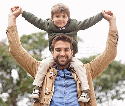 Buy stock photo Father, child and portrait on shoulders in nature for happiness bonding, connection or vacation. Male person, son and face at environment park for outdoor love as parent care, relaxed or together