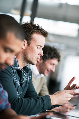 Buy stock photo Typing, man and meeting in office with phone research or communication of project with notes in email. Professional, team and person planning schedule with smartphone or reading information online