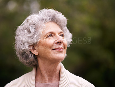 Buy stock photo Happy senior woman, smile and thinking in nature for hope, joy or retirement in the outdoors. Face of thoughtful elderly female smiling in happiness, future or reflection for natural life or vitality