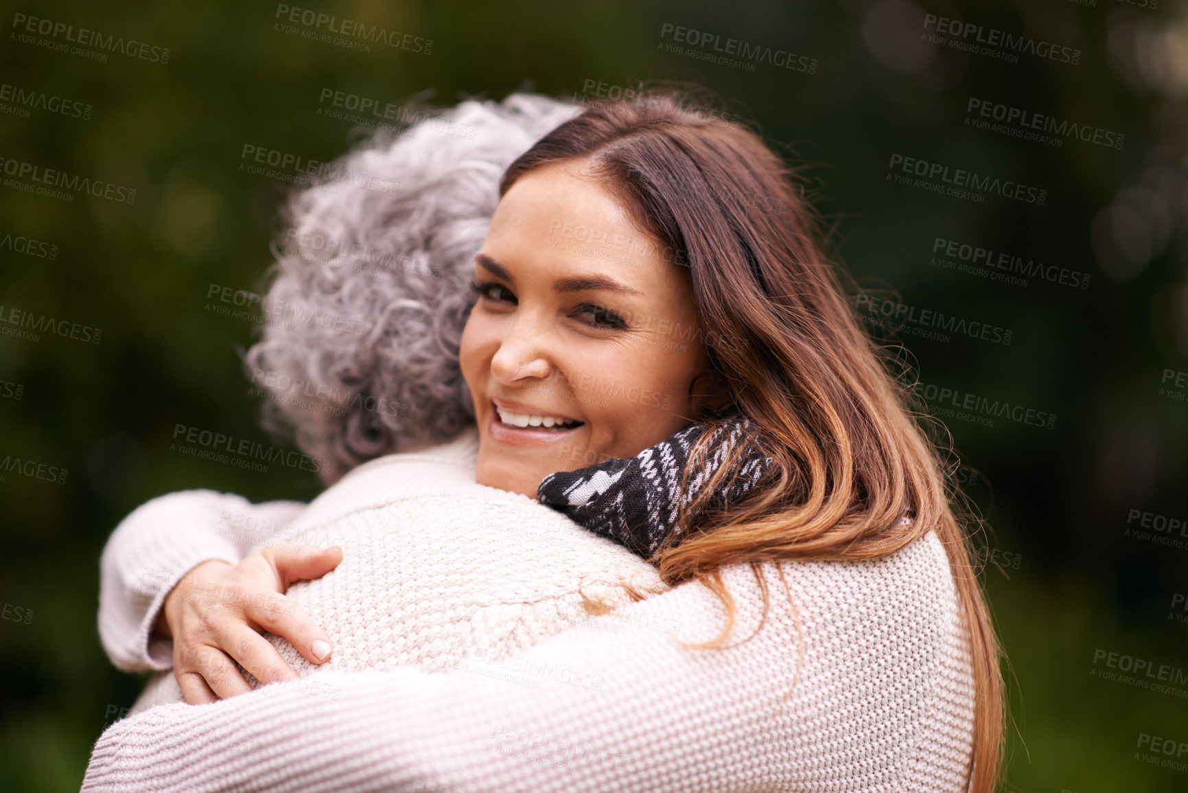 Buy stock photo Hug, mother and face of woman with love, embrace and affection for bonding with happiness. Family, elderly female person and daughter with mom outdoor in garden, backyard and terrace in nature