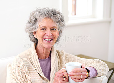 Buy stock photo Sofa, coffee and portrait of elderly woman in living room for morning, weekend and retirement. Relax, smile and senior person with happiness for warm beverage, drink and satisfaction at home