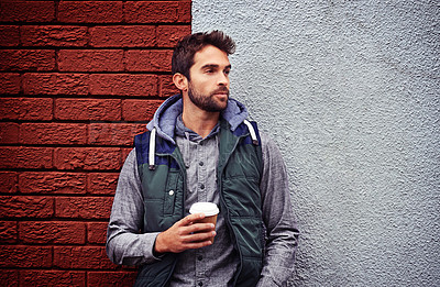 Buy stock photo Fashion, wall or man with coffee thinking of casual clothes, style or edgy hoodie for winter outdoor outfit. Tea, cool model or stylish person in urban town in streetwear or trendy jacket in Italy