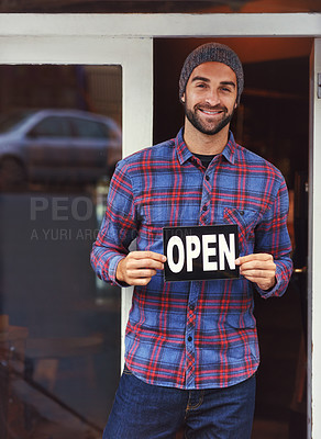 Buy stock photo Small business, cafe and portrait of man with sign at entrance of restaurant with smile. Open, confidence and entrepreneur at coffee shop with career in service, hospitality and happiness at door