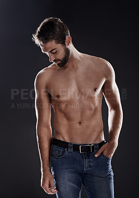 Buy stock photo Thinking, abs and body of man in studio isolated on black background for wellness, fitness or eyes closed. Confidence, topless and muscle of person for health, serious or strong bodybuilder in jeans