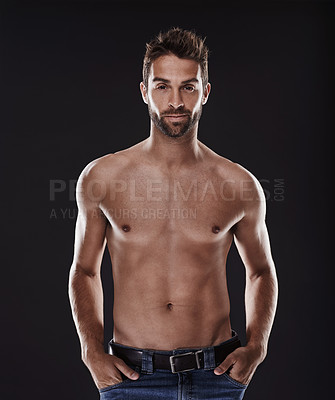 Buy stock photo Portrait, abs and body of confident man in studio isolated on black background for wellness, fitness or exercise. Face, topless and muscle of person for health, serious or strong bodybuilder in Spain