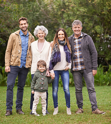 Buy stock photo A multi-generation family standing outdoors