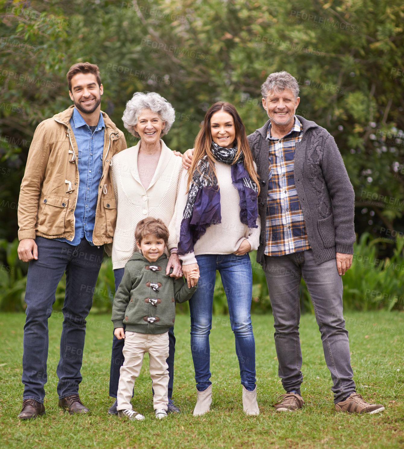 Buy stock photo A multi-generation family standing outdoors