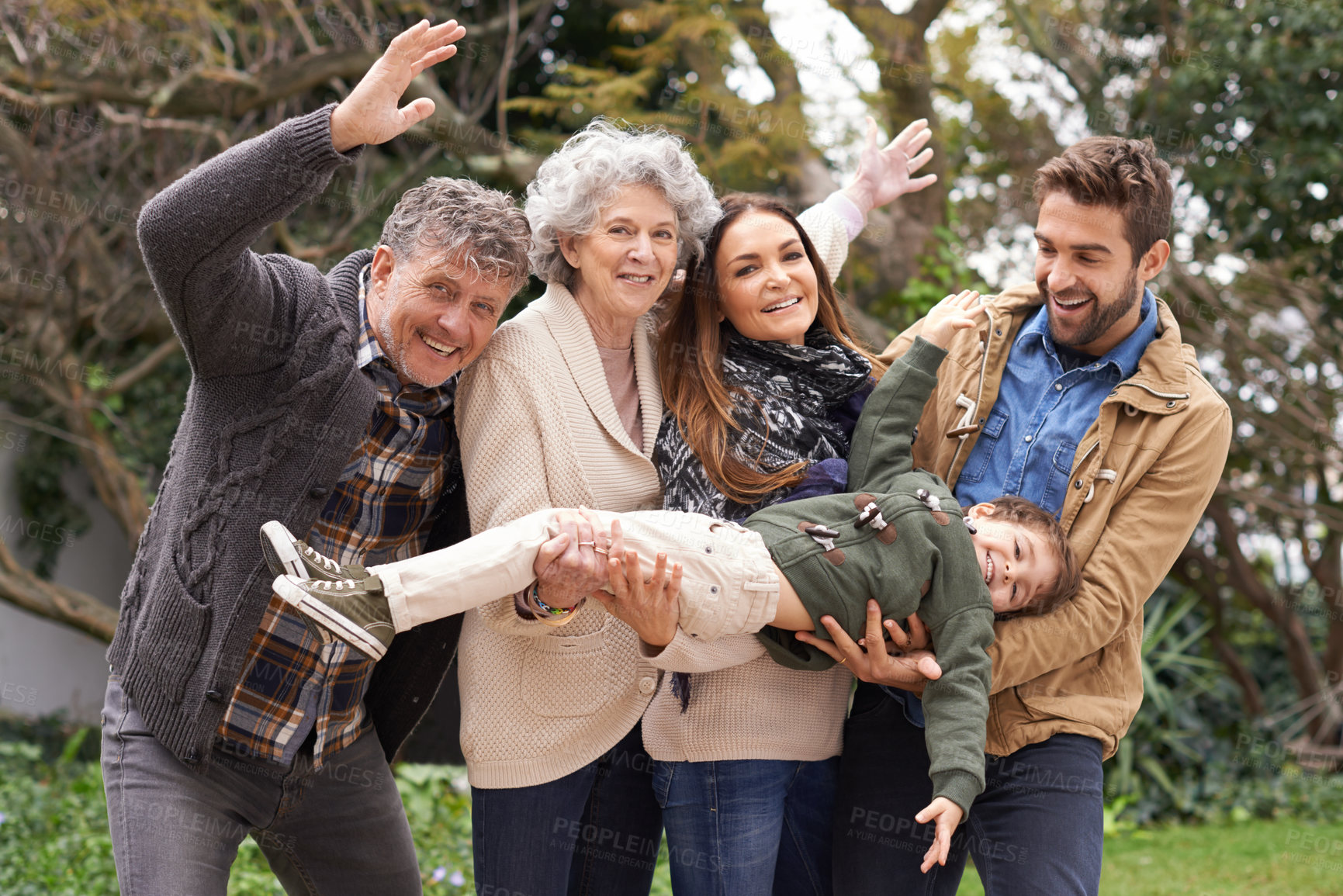 Buy stock photo Happy family, child and portrait of people playing with kid in a park on outdoor vacation, holiday and excited together. Grandparents, happiness and parents play as love, care and bonding in nature