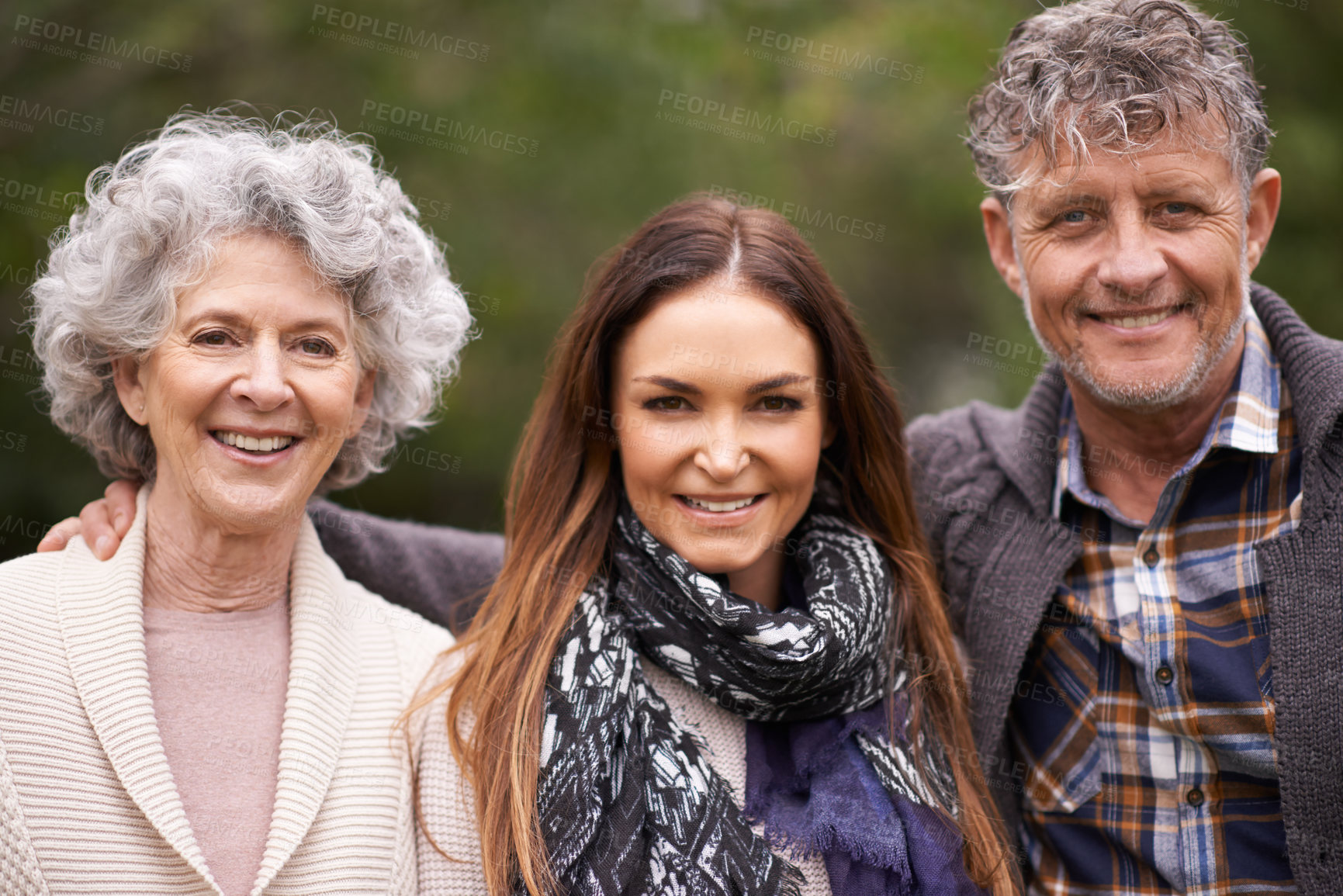 Buy stock photo Portrait, hug and senior parents with daughter, outdoor and happiness with nature and bonding together. Face, family or group with fresh air and embrace with smile and elderly mother with old father