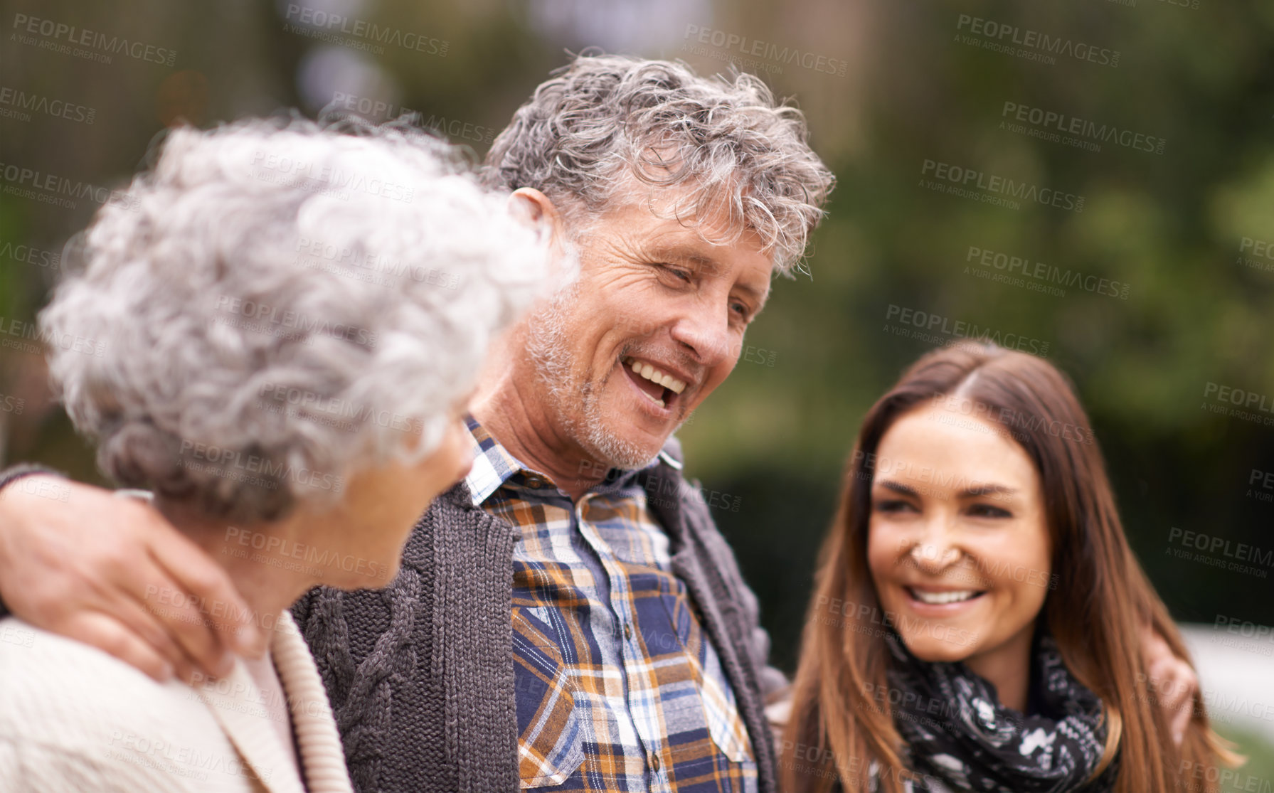 Buy stock photo Senior parents, hug and outdoor with daughter, adult and happy with humor and bonding together. Nature, old mother or elderly father with embrace or vacation with smile or cheerful with weekend break