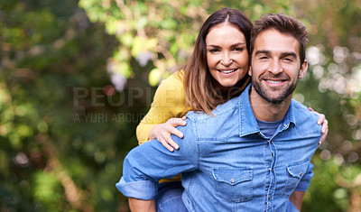 Buy stock photo Portrait, woman and man with piggyback in nature or park for bonding, dating and relationship with smile. Couple, love and romantic in backyard or outdoor with joy, excited and commitment in marriage