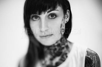Buy stock photo Portrait, tattoo and gothic woman in a tank top on black and white background for edgy style in studio. Face, unique and female punk model with ink on skin for art, fashion or creative expression 