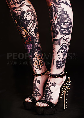 Buy stock photo Tattoo, shoes and closeup of woman feet in studio with fashion gothic, skin or artistic expression on black background. High heels, art or female model for punk, grunge or rock and roll aesthetic