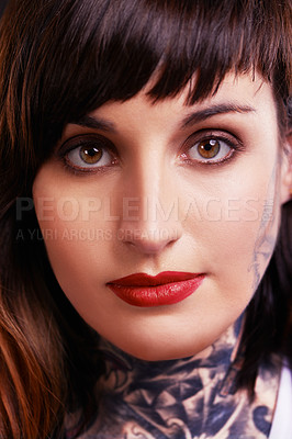 Buy stock photo Portrait, tattoo and face of gothic woman in studio for edgy or rebel style in a closeup for red lipstick. Makeup, unique or cool punk model with ink on skin for art, fashion or creative expression