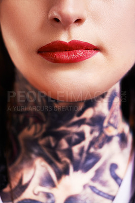 Buy stock photo Closeup, red lipstick and woman with tattoos, makeup and culture with rebel and confident. Person, mouth and product with ink and artistic with tradition and design with pattern and shine with glow