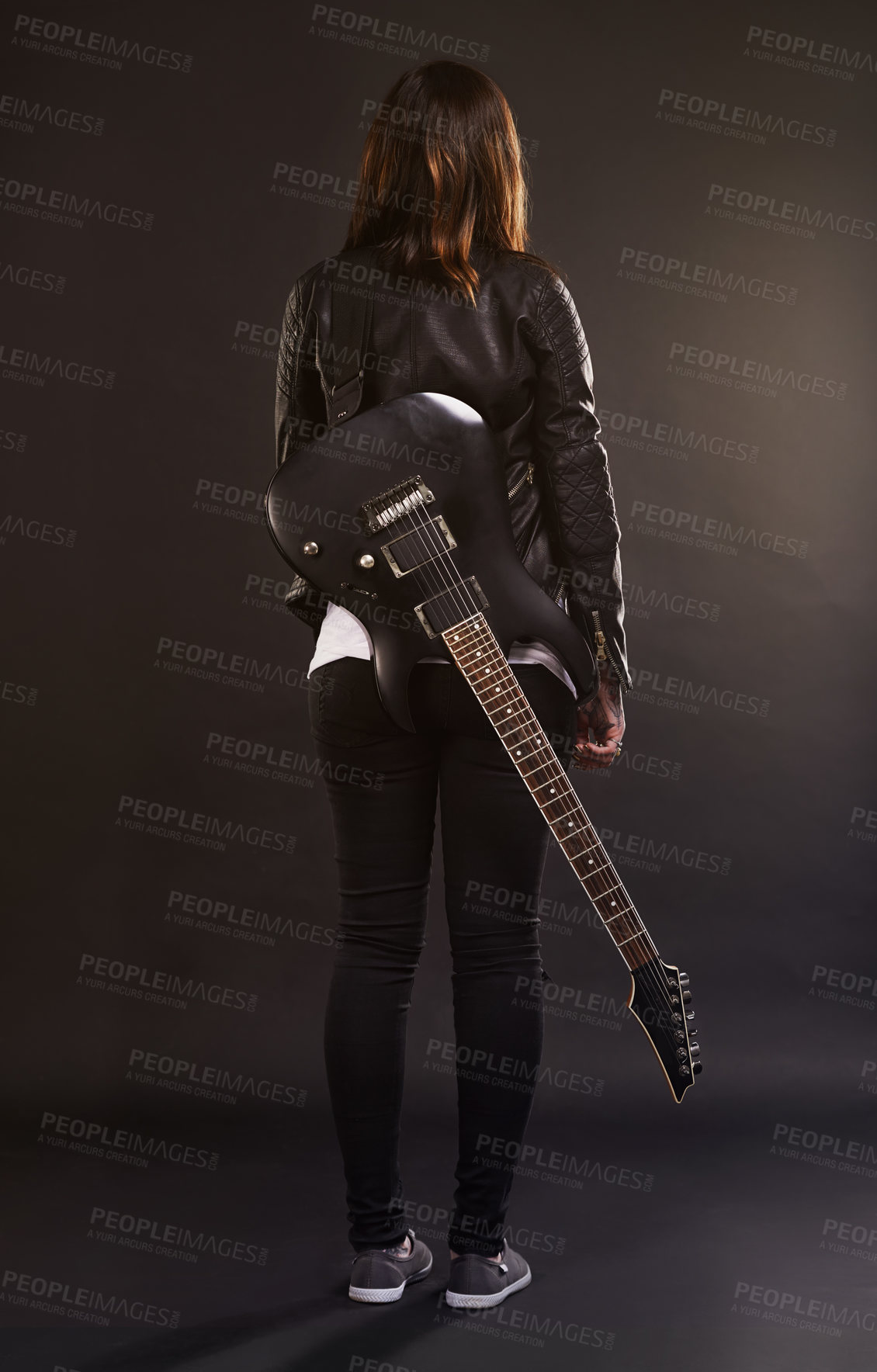 Buy stock photo Woman, guitar and fashion for musical instrument, sound and trendy for retro and style on dark background. Young person or musician for creative, funky and edgy for bold with leather jacket for rock