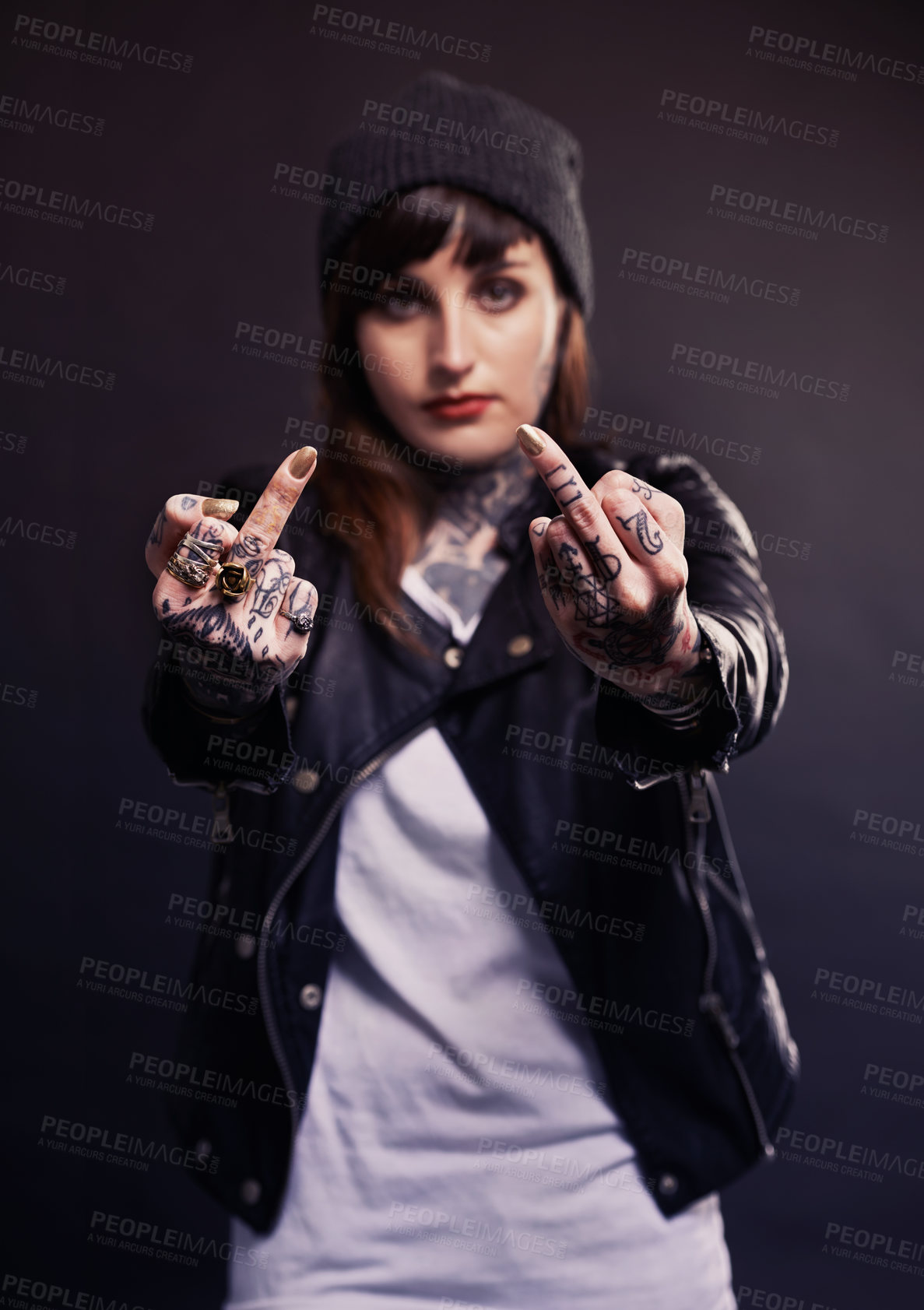 Buy stock photo Fashion, portrait or woman with middle finger, tattoo or attitude in studio with gothic, style or artistic expression on black background. Rebel, face or emo model with hand emoji or grunge aesthetic