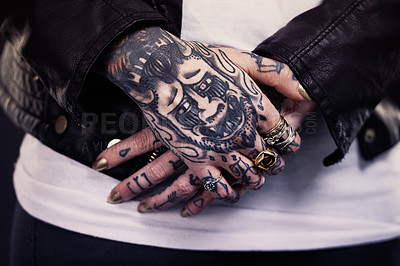 Buy stock photo Woman, hands and tattoo on body with nails and leather for creative and ink design for picture and unique. Art on skin for bold and cool with ring for statement with gold for funky, trend and pattern