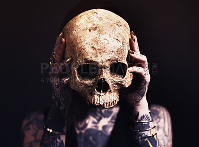 Buy stock photo Skull, scary and woman with tattoo in studio for dark magic, horror or artistic aesthetic with mask. Creative nightmare, halloween culture or unique person with bones for demon on black background