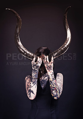 Buy stock photo Horns, demon and woman with tattoo in studio for dark magic, horror or artistic aesthetic with mask. Creative nightmare, halloween culture or unique female person with scary bones on black background