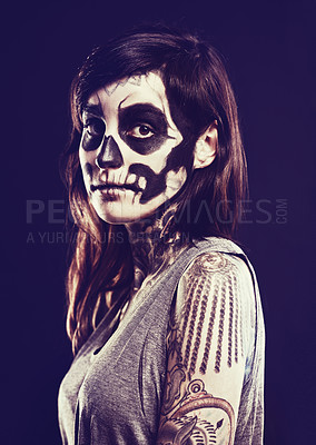 Buy stock photo Skull, costume and portrait of woman on dark background for festival, Halloween and day of the dead. Creative art, makeup and person with face paint for horror, scary and gothic aesthetic in studio