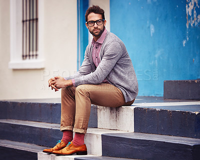 Buy stock photo Man, building and relax on stairs for fashion, clothes and trendy with glasses outdoor in Cape Town, South Africa. Male person, gen z guy and vision for unique outfit, garment and urban style 