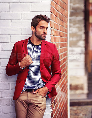 Buy stock photo Man, think and fashion in urban wall or outdoor with outfit for casual or office wear for trends and style. Confident, street and city in elegant clothes with blazer in downtown for classy look
