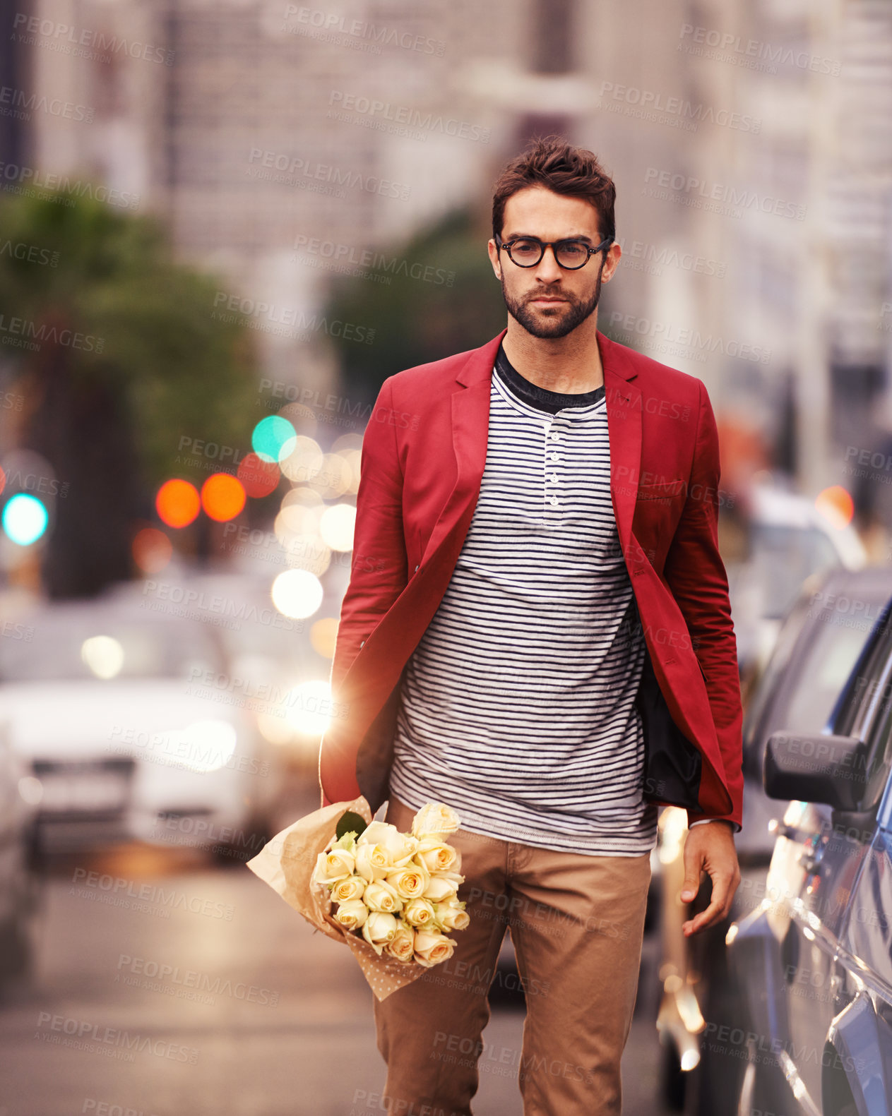 Buy stock photo Man, street and flower for fashion in city outdoor with casual outfit for date night, trends and style. Portrait, confident and urban road in elegant clothes with bouquet in downtown for surprise 